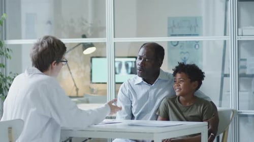 Child and Adult Patient Consult with Female Doctor