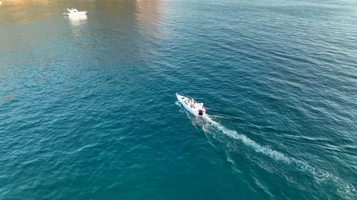 Sports Boat Sails and Makes Beautiful Turns Aerial View 4 K