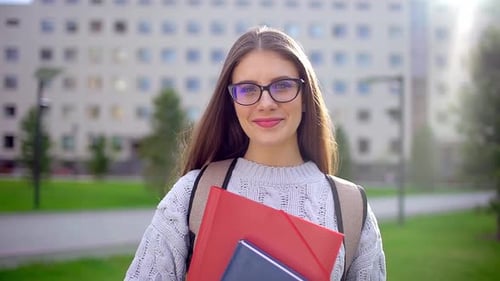 Woman Student Outdoors Smiling Education on Background of Campus University
