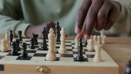 Chess Game Played on Wooden Chess Board