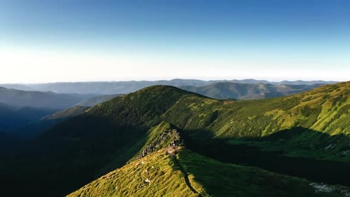 Outdoor activities in the mountains in summer. Summer hike in sunny weather