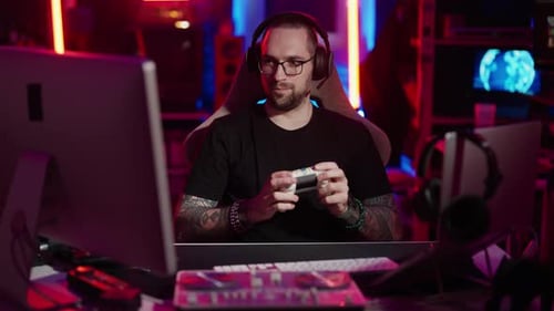 Young Adult Gaming with Colorful Neon Lights