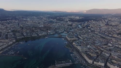 Aerial Panoramic Footage of City at Lake Morning Scenery with Mountains in Background Geneva