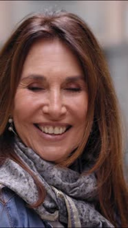 Video Senior Beautiful Woman Smiling Happy Looking at Camera Standing on Historical City Street