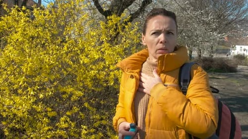 Woman with Asthma in Blooming Park