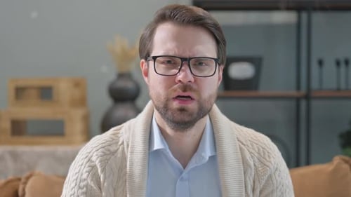 Man Yelling in Frustration Indoors