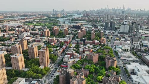 An aerial view of a city with lots of tall buildings
