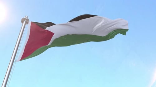 Palestine Flag Waving on Flagpole with Blue Sky