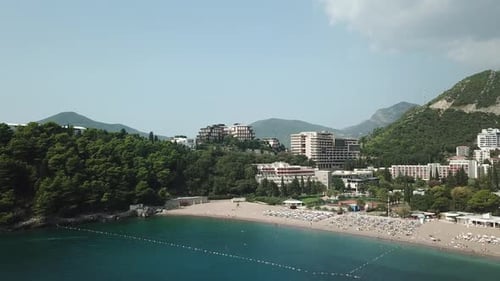 resort town holiday destination Adriatic Sea Montenegro becici budva aerial drone footage