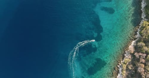 Aerial of a motorboat heading toward the shore, Croatia
