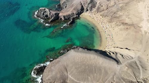Aerial view of costa de papagayo beach and cliffs, Spain.