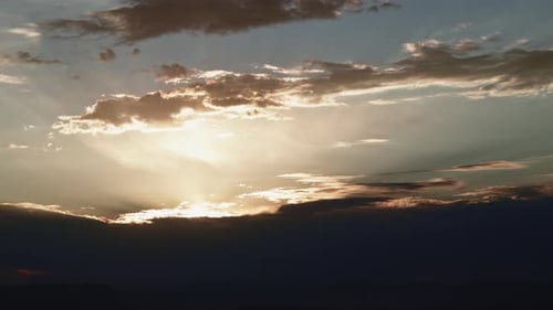 Golden Sky with Clouds at Sunset