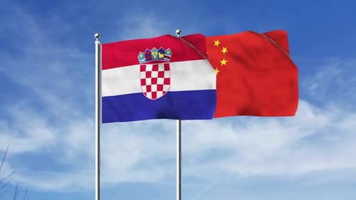 Croatia and China National Flags Waving Against Blue Sky