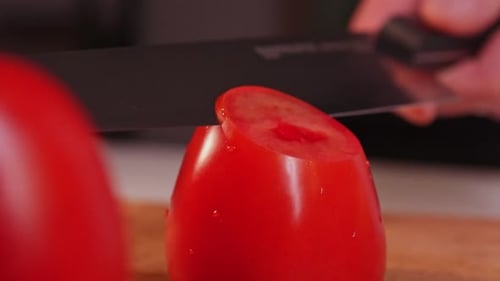 Chef Slices PaperThin Tomato Slice with Sharp Knife
