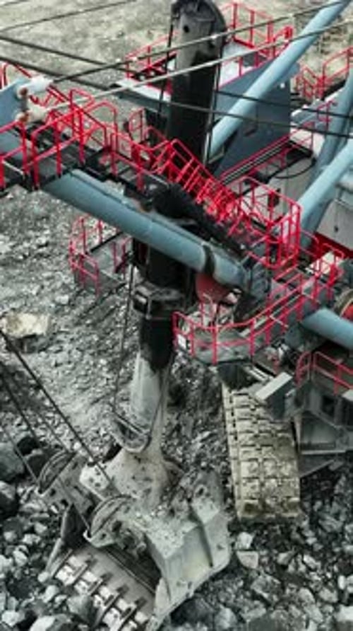 Giant Excavator Gathering Rocks in a Quarry Stock Clip