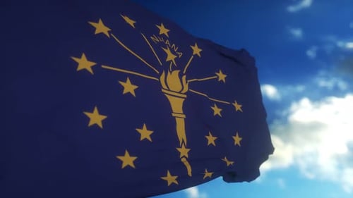 Indiana Flag on a Flagpole Waving in the Wind in the Sky State of Indiana in The United States of