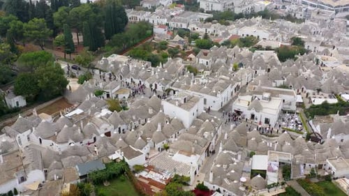 The traditional Trulli houses in Alberobello city, Apulia, Italy. Cityscape over the traditional roo