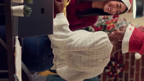 Vertical Video Multiethnic Team of Coworkers Exchanging Xmas Gifts