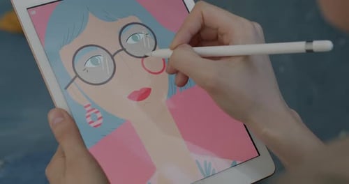 Artist Illustrating Digital Art on Tablet