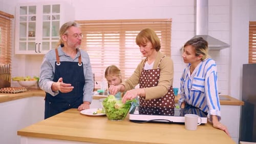 Family Prepares Healthy Meal Together in Sunny Kitchen