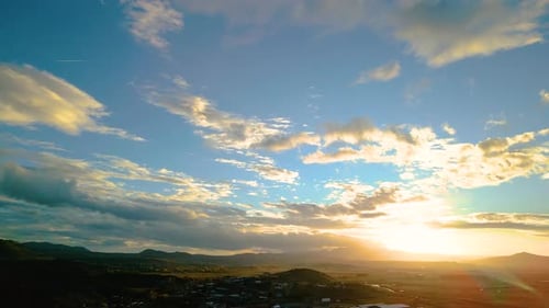 Golden Sunrise Over Quiet Rural Landscape