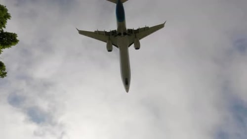 Jet airliner landing on runway.