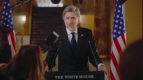 Official Speaks at Press Conference at White House