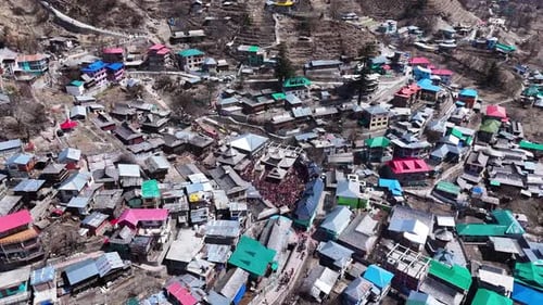 Festive Celebration in Remote Colorful Village, Aerial View