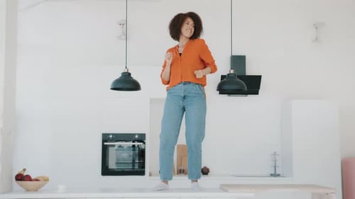 Woman Dancing on a Kitchen Counter