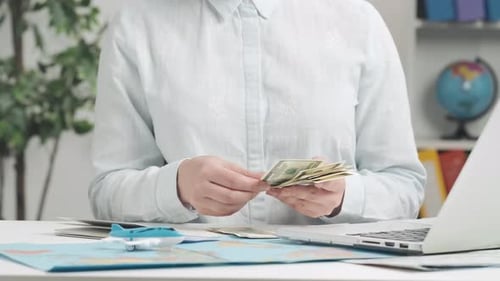 Travel Agent Woman Counting Money