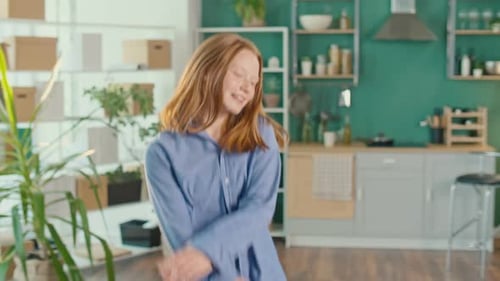 Energetic Child Dancing Joyfully in Modern Home