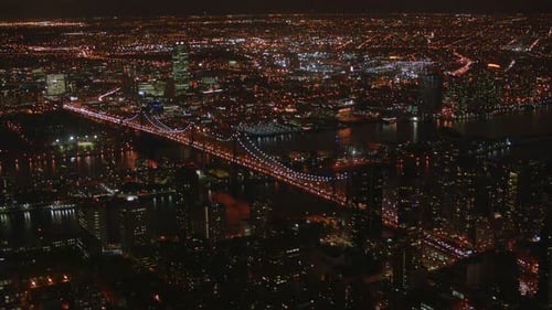 Queensboro bridge night traffic flowing into manhattan New York City aerial