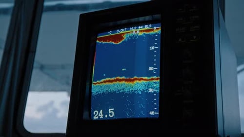 Sonar Display on Boat Bridge With Blue Hour Ambient Lighting