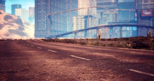Une route déserte s'étend vers les toits futuristes de la ville par temps clair