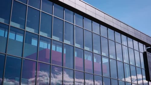 View From the Street The Facade of a Modern Commercial or Office Building Large Panoramic Windows