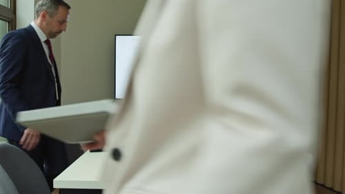 Diverse Group Attends Business Presentation in Office