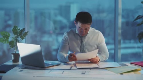 Urban Designer Analyzing Blueprints Individual Architect Diligently Reviewing Detailed City Plans at