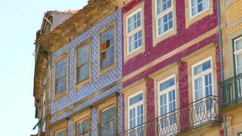Vintage Tiled Walls Of Houses In The Historic Streets Of Porto, Portugal. Low Angle Shot