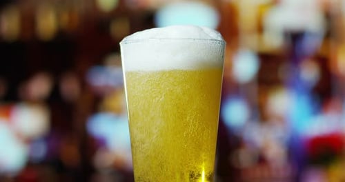 Beer Pouring Into Glass Close Up