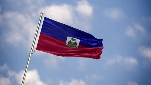 Haiti Flag Waving in the Wind against a Blue Sky