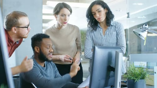In the Busy Corporate Office Team of Diverse Young Creative People Work on a Problem Solution. Coll