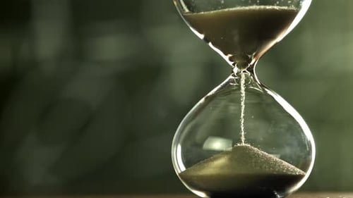 Super Slow Motion Sand Fall in the Hourglass Filmed on a Highspeed Camera at 1000 Fps