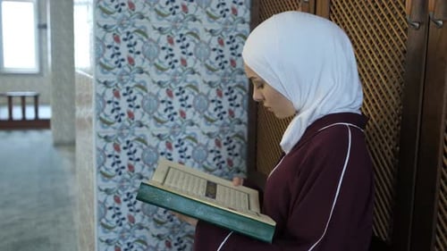 Praying Quran On Mosque