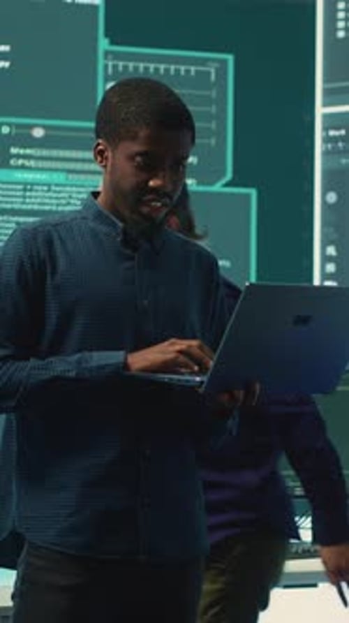 IT Professionals Collaborate in Tech Workplace