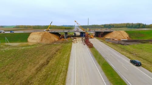 Road Bridge Construction. Aerial View of Bridge Construction Over Highway. View From