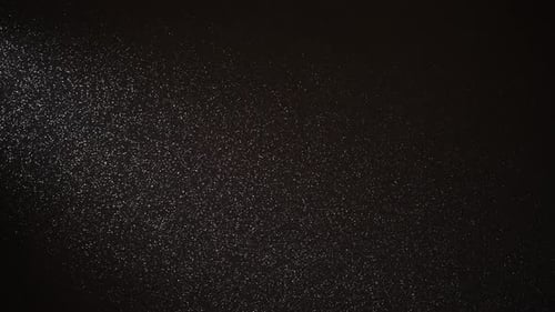 Abstract Sparkling Dots on a Dark Background