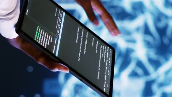 Vertical Video Professional Updating AI Systems, Technology Stock ...