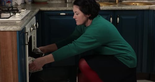 Woman Baking Dessert in Home Kitchen