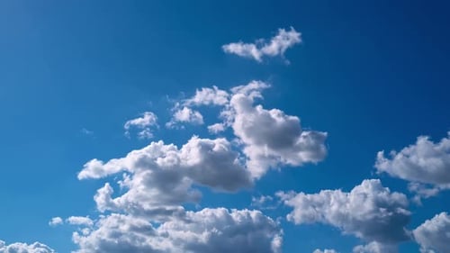Clouds Moving Across Blue Sky Time Lapse
