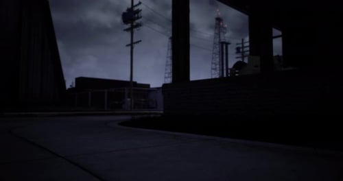 Cinematic Dark Industrial Night Scene with Power Lines